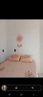 Uma cama ou camas num quarto em Brisa Oceanica