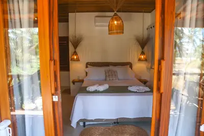 Uma cama ou camas num quarto em Villa Loui Beach Icaraizinho-Ce