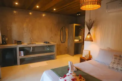 Uma cama ou camas num quarto em Villa Loui Beach Icaraizinho-Ce
