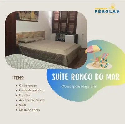 Uma cama ou camas num quarto em Pérolas Beach Hotel