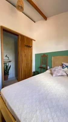 Uma cama ou camas num quarto em Casa da Tânia Preá