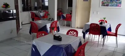Uma área de estar em Nalu Beach Hotel pousada
