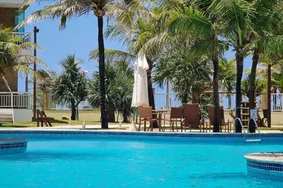 A piscina em ou perto de Paraíso das Dunas #15 - Pé na Areia By Carpediem