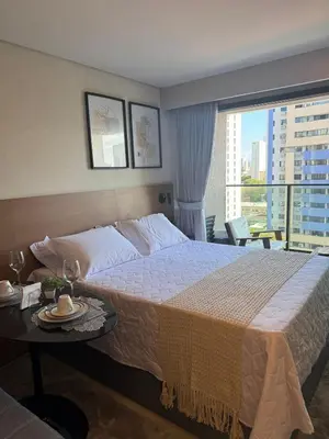 Uma cama ou camas num quarto em Studio no Meireles 5 min da Beira Mar