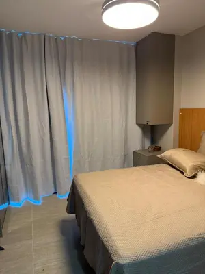 Uma cama ou camas num quarto em Apartamento em Fortaleza