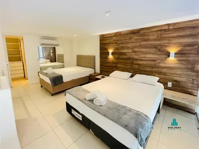 Uma cama ou camas num quarto em Loft Praia by Holiday Stays