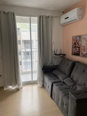 Uma área de estar em Apartamento aconchegante