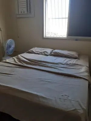 Uma cama ou camas num quarto em Apê Fortaleza Beira-Mar