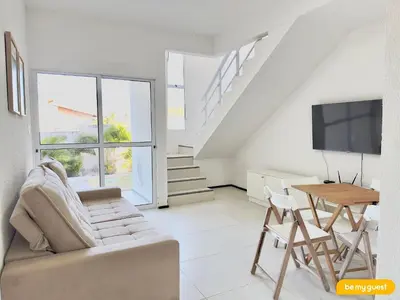 Uma televisão e/ou sistema de entretenimento em Beach Townhouses IV