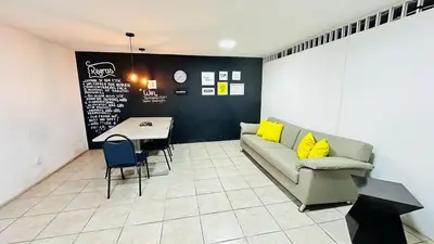 Uma área de estar em Flat av beira mar lindo e aconchegante