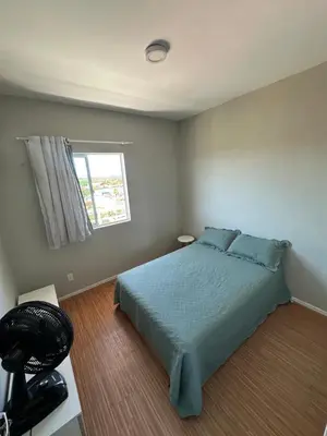 Uma cama ou camas num quarto em Apartamento com 3 quartos