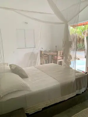 Uma cama ou camas num quarto em Casa Mantra