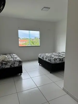 Uma cama ou camas num quarto em Casa Paraiso
