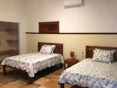 Uma cama ou camas num quarto em Casa dunas