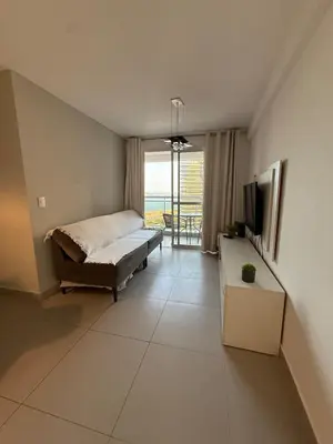 Uma televisão e/ou sistema de entretenimento em Fortaleza Apartment