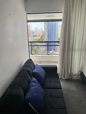 Uma área de estar em Flat via venetto