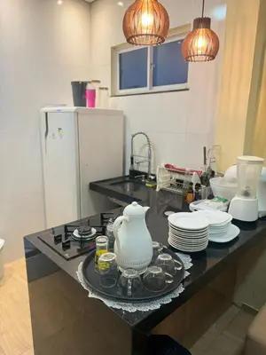 A cozinha ou kitchenette de Apartamento refúgio