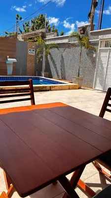 Uma varanda ou terraço em CASA COM 04 QUARTOS 04 BANHEIROS PRAIA do PREÁ