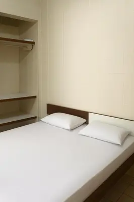 Uma cama ou camas num quarto em Hotel Lídia