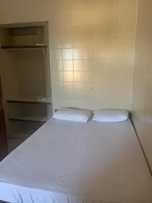 Uma cama ou camas num quarto em Hotel Lídia