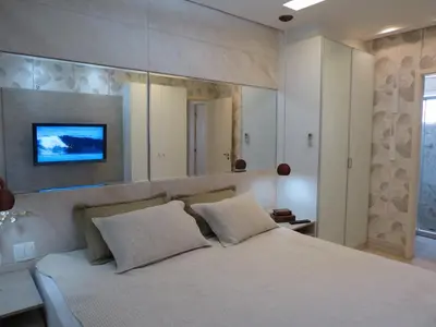 Uma cama ou camas num quarto em Conforto e Lazer na Frente do Mar ao Lado do Beach Park