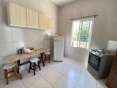 A cozinha ou kitchenette de Casa Frente Mar na Cidade Luz
