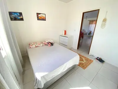 Uma cama ou camas num quarto em Casa Frente Mar na Cidade Luz