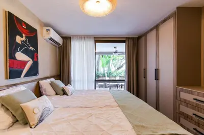 Uma cama ou camas num quarto em Apartamento Tamy Wai Wai