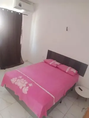 Uma cama ou camas num quarto em Pousada Apart Praia Uruaú