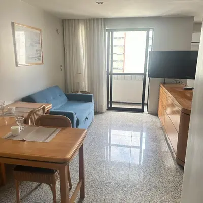 Uma televisão e/ou sistema de entretenimento em Flat Beira Mar para até 4 pessoas