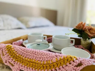 Uma cama ou camas num quarto em Apart Serra Bella Guaramiranga