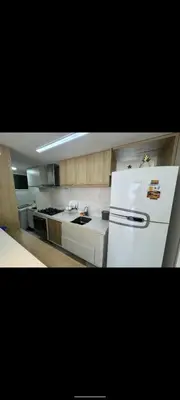 A cozinha ou kitchenette de Apartamento por temporada Edifício Amazonas