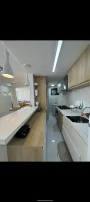 A cozinha ou kitchenette de Apartamento por temporada Edifício Amazonas