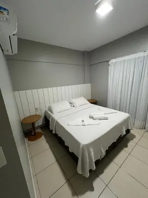 Uma cama ou camas num quarto em Apto Beverly Hills Residence, próx Beach Park