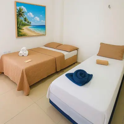 Uma cama ou camas num quarto em VGFUN-447 3 quartos 2 wcs Vista Mar Pé na Areia Praia do Futuro