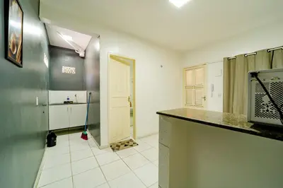 A cozinha ou kitchenette de Flat Pet Friendly prox ao Aeroporto