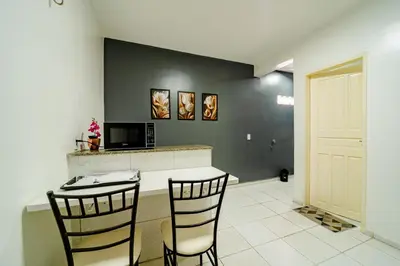 A cozinha ou kitchenette de Flat Pet Friendly prox ao Aeroporto