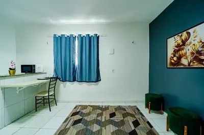 Uma cama ou camas num quarto em Flat com Wi-Fi a Poucos Metros do Aeroporto
