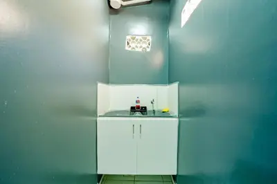A cozinha ou kitchenette de Flat com Wi-Fi a Poucos Metros do Aeroporto