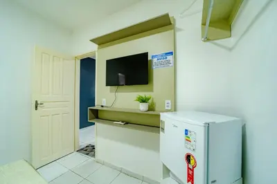A cozinha ou kitchenette de Flat com Wi-Fi a Poucos Metros do Aeroporto