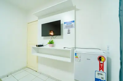 A planta de Flat c Wi-Fi e Smart TV Perto do Aeroporto