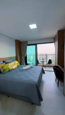 Uma cama ou camas num quarto em Hospede-se com charme e praticidade no Meireles