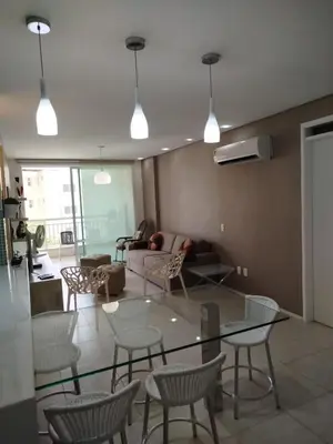 Uma área de estar em Apartamento boa vida