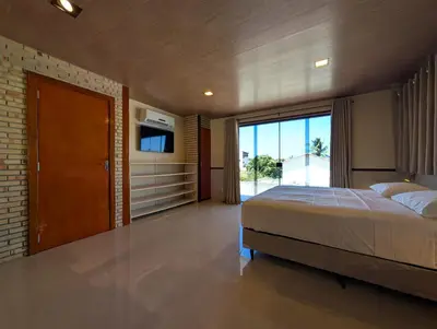 Uma cama ou camas num quarto em Parawing Paracuru