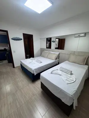 Uma cama ou camas num quarto em Elegance Residences Cumbuco