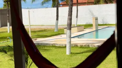 A piscina em ou perto de Recanto do Aconchego