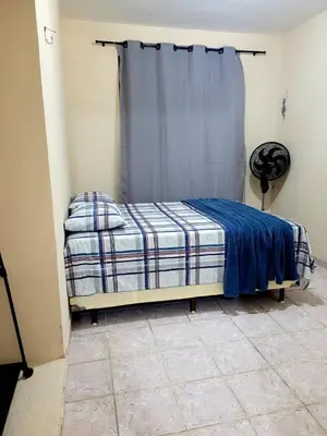 Uma cama ou camas num quarto em Spacious Apartment Close to Praia do Futuro