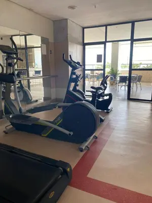 O centro de fitness e/ou as comodidades de fitness de Flat mobiliado na Beira Mar no hotel Blue Tree