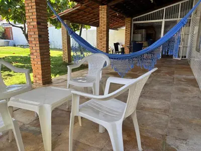 Um pátio ou outra área exterior em Casa Pé na Areia - Com PISCINA, CHURRASQUEIRA E VISTA PRIVILEGIADA - Beberibe