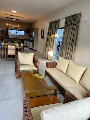 Uma área de estar em Casa Bons Ventos Preá
